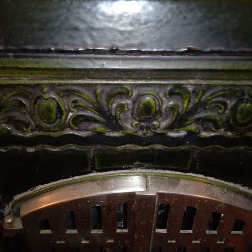 Cast iron stove used for briquettes and wood