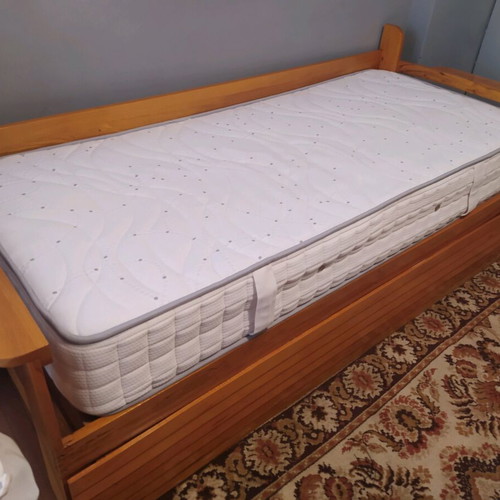 Wooden sofa bed with storage and new Mediastrom mattress used