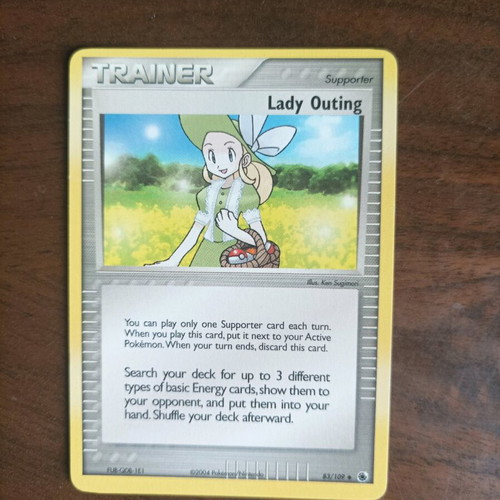 Trainer (Lady Outing) Pokemon card like new, original