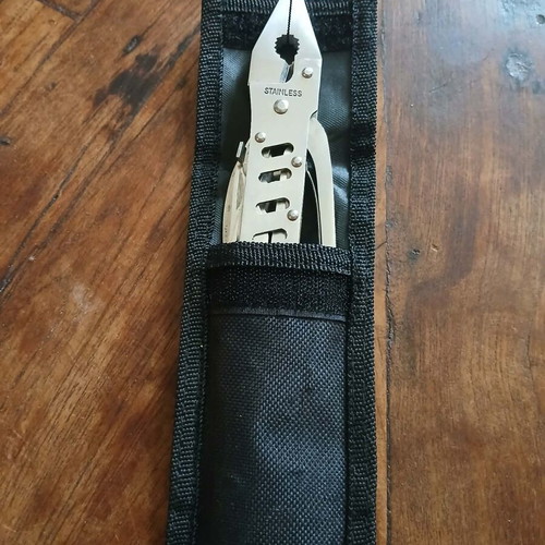 Folding stainless steel multitool new with case