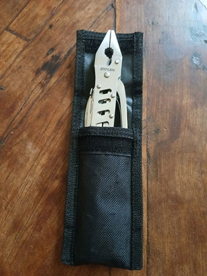 Folding stainless steel multitool new with case