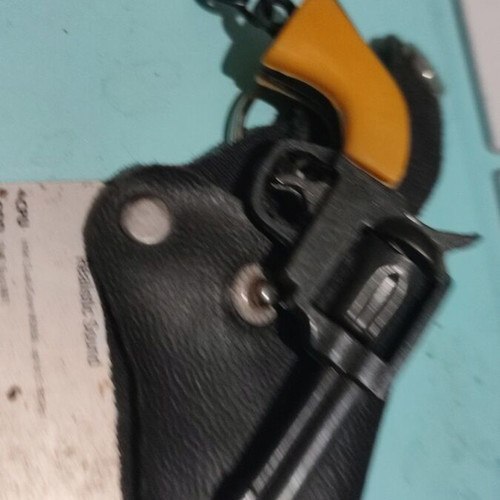 Miniature 1975 Minion Metal Keychain Gun like new