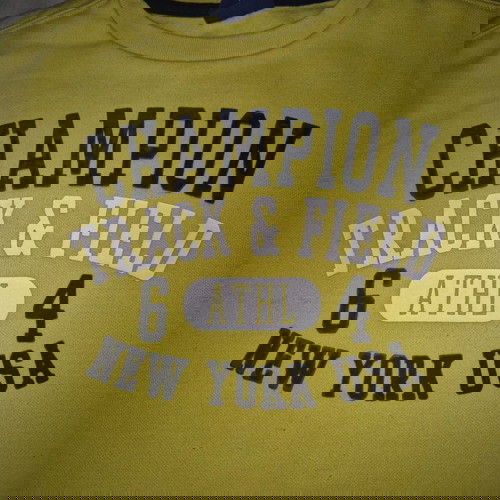 Champion yellow sweatshirt used for 9-10 years with blue print