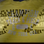Champion yellow sweatshirt used for 9-10 years with blue print