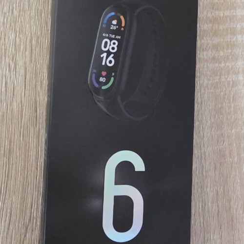 Xiaomi Mi Band 6 fitness tracker with accessories