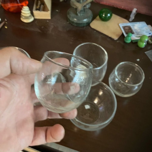 Glass tealight holders like new, set of 6, various sizes