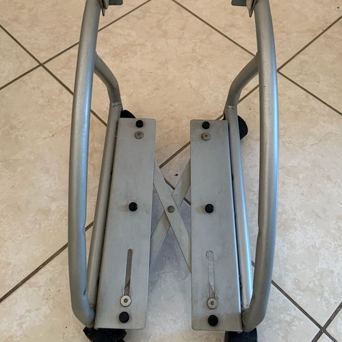 Metal computer tower stand used with wheels