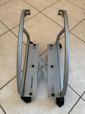 Metal computer tower stand used with wheels
