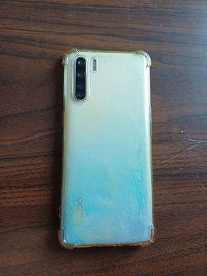 Oppo F15 smartphone used with shockproof case and screen protector OLED display