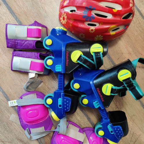 Kids roller skates used, gift set with helmet and knee pads