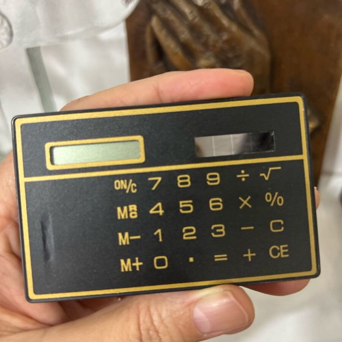 Ultra Thin Calculator with Touchscreen and Solar Power, Like New