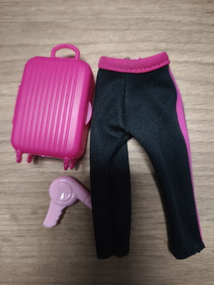 Barbie doll accessories used, suitcase, hair dryer and tracksuit