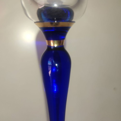 Glass candlestick like new with gilded details