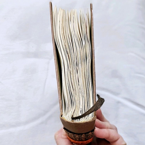 Refurbished book To Kane-Oti-Theleis with stones and 92 pages