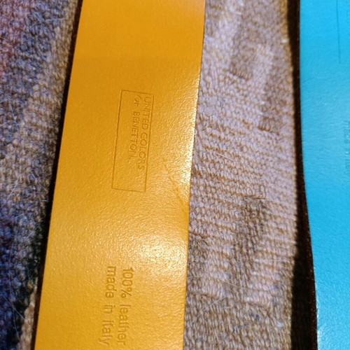 Three Benetton belts used, two leather and one fabric