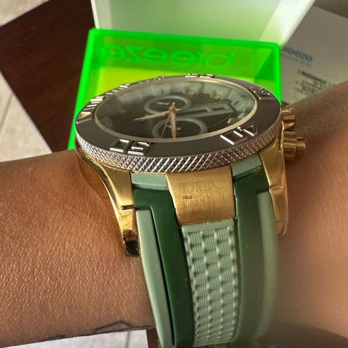 Breeze wristwatch used, green and gold unisex