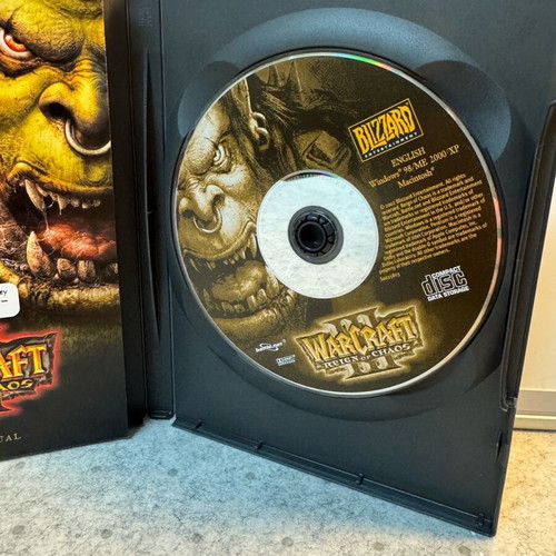 Warcraft PC games set used, Warcraft 2 Battle.net Edition no manual, Warcraft 3 with manual