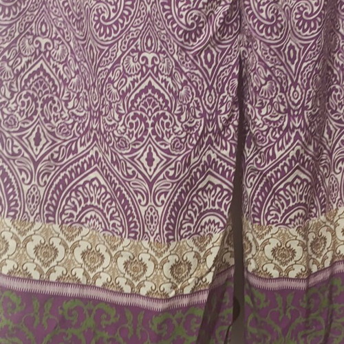 Two Pants like new, one magenta with green, one blue with dark blue, one size