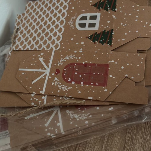 Craft supplies like new, boxes, stickers, decorative flowers and shells
