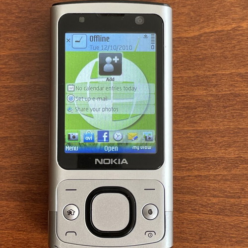 Nokia 6700s phone used with metal body and original battery