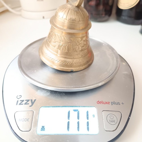 Bronze bell used with traditional engraved floral motifs