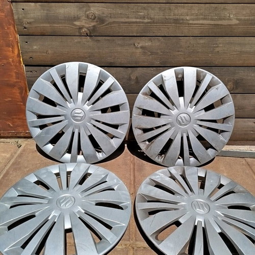 Suzuki Swift hubcaps used, set of 4 for 15 inch rims