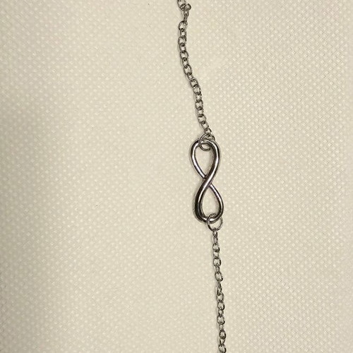 Hoop earrings and infinity bracelet like new, silver