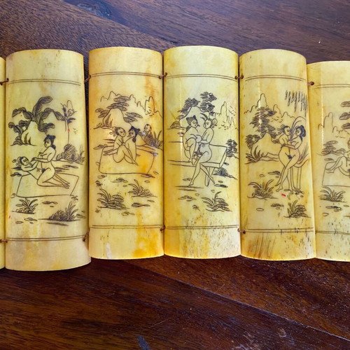 Vintage Asian folding bone carving with erotic scenes in natural ox bone