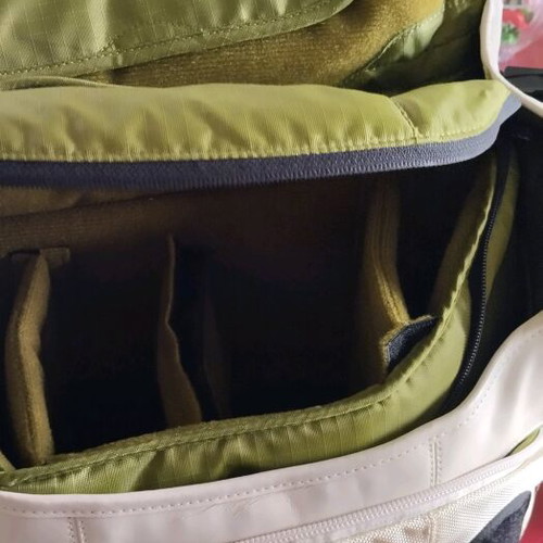 Crumpler professional photographer bag used with multiple compartments