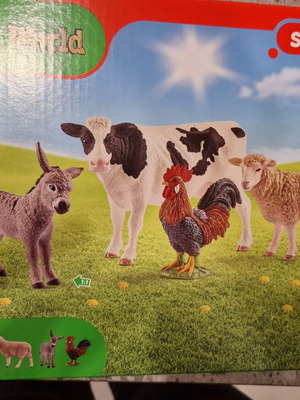 Schleich Farm World starter playset with cow, sheep, rooster, donkey