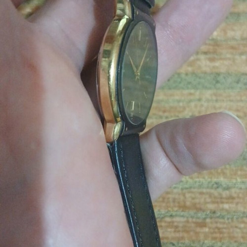 Citizen Quartz vintage wristwatch used, black and gold tone