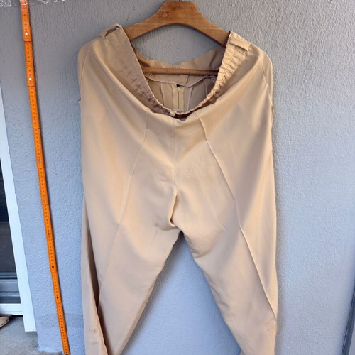 Women's high-waisted pants with pleats used, beige