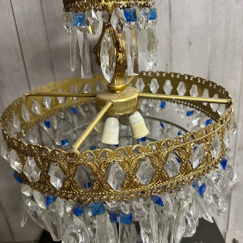 Vintage gold chandelier used with crystals and blue details