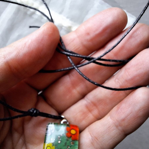Necklace pendant with green floral design