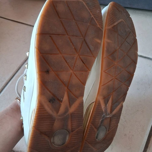 Seven sneakers used, size 37, white with gold details
