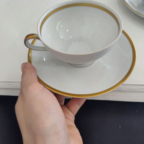 Porcelain tea cup set used, two cups with saucers