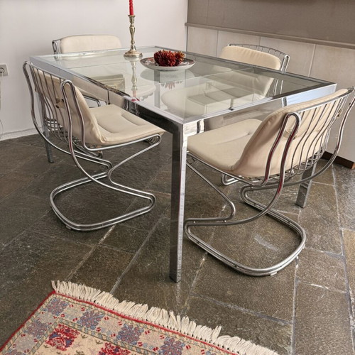 Italian kitchen table with leather chairs, stainless steel frame, used