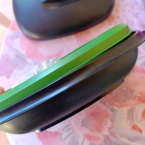 Oval Tupperware server with strainer new, black and green