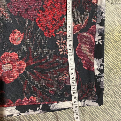Set of two pencil skirts used, black and white and floral