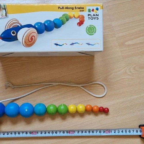 PlanToys wooden pull-along snake like new for 12+ months