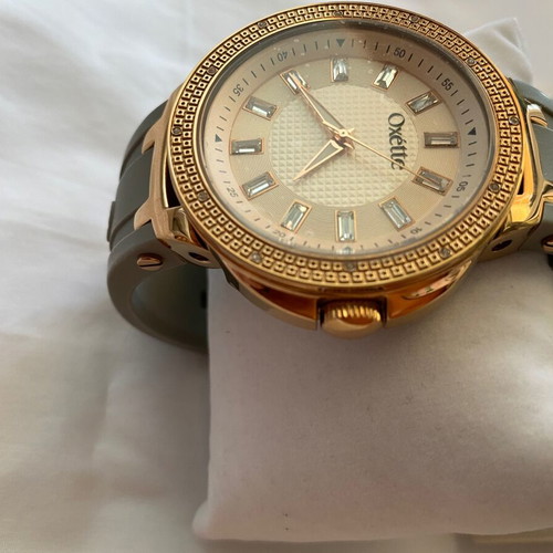 Oxette women's watch new in green and gold with crystals