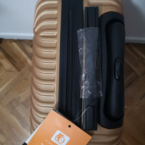 Small suitcase new, gold color