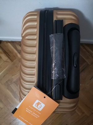 Small suitcase new, gold color