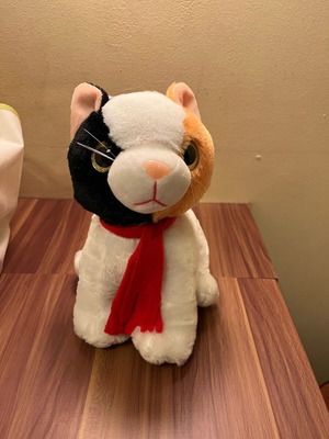 Plush cat with Christmas hat like new