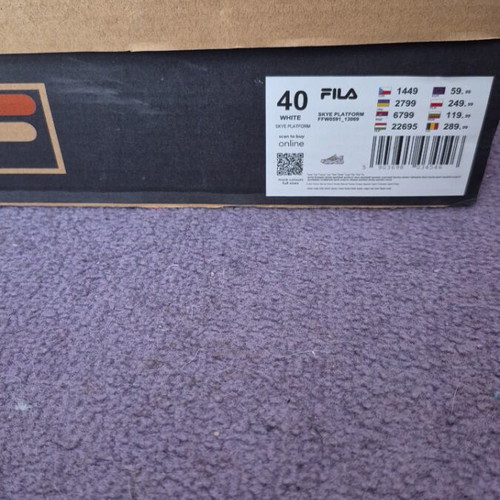 Fila women's white sports shoes with gold detail new