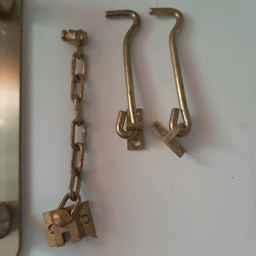 Door handle like new with brass latch and 2 hooks
