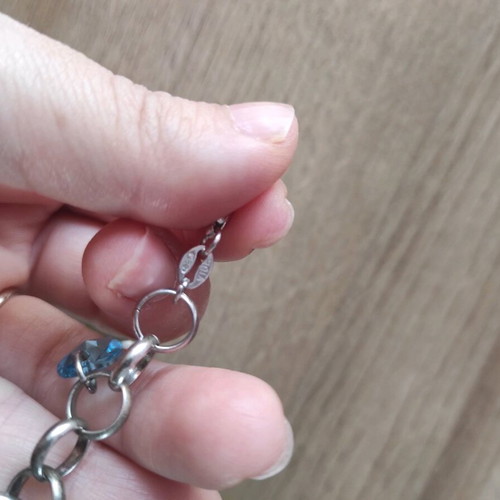 Silver 925 bracelet like new with multicolored dangling zircon hearts