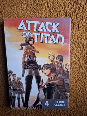 Attack On Titan manga volume 4 by Hajime Isayama