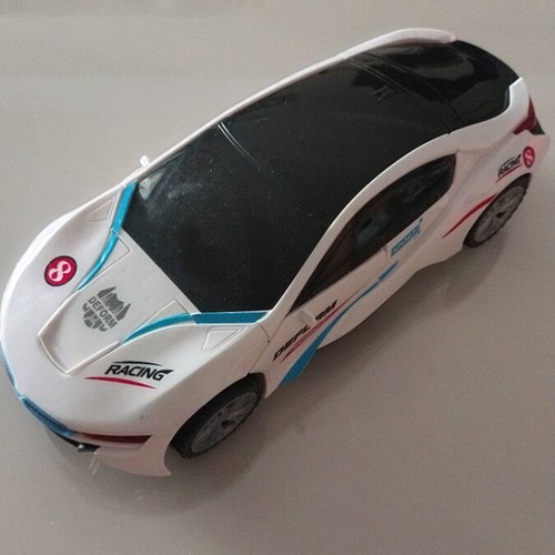 Robot car used with sounds and lights, transforms from car to robot