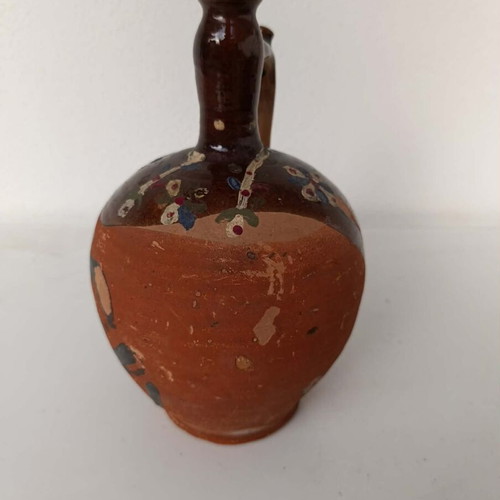 Clay jug with handmade painting used